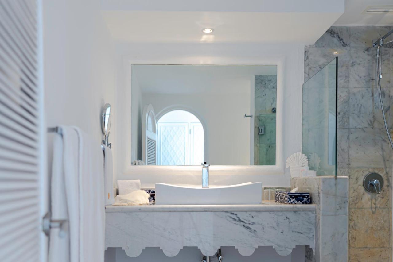 Las Hadas By Brisas Manzanillo Εξωτερικό φωτογραφία Bathroom mirror