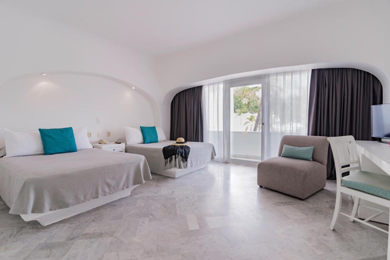 Las Hadas By Brisas Manzanillo Εξωτερικό φωτογραφία A room at the hotel